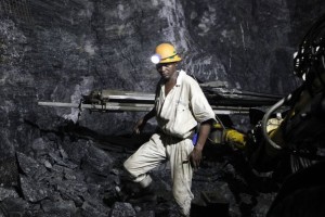 A mine worker is seen underground in South Deep mine outside Johannesburg