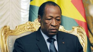 Burkina Faso's President Blaise Compaore waits prior to meeting relatives and acquaintances of the victims of the Air Algerie crash at the Presidential Palace in Ouagadougou on July 26, 2014. The second black box from the Air Algerie plane disaster was recovered on July 26 at the remote crash site in northern Mali as investigators headed to the scene to determine the cause of the tragedy. Compaore met on July 26 with relatives of some crash victims in Ouagadougou and announced that Burkina Faso has opened an official inquiry into the cause of the disaster. AFP PHOTO/ SIA KAMBOU