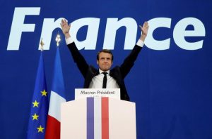 Macron, head of the political movement En Marche !, or Onwards !, and candidate for the 2017 French presidential election, celebrates after partial results in the first round of 2017 French presidential election, in Paris